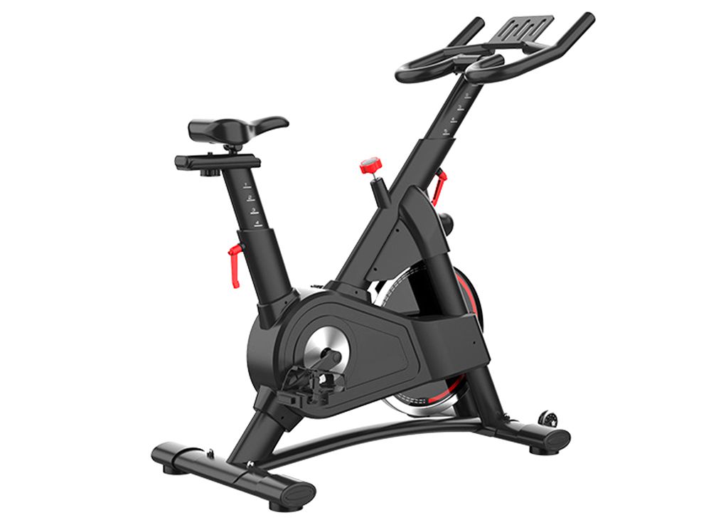 Крытый стационарный тренажер на вращающемся велосипеде Крытый стационарный тренажер на вращающемся велосипеде